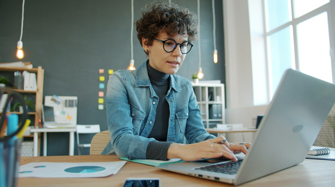 businesswoman using laptop data