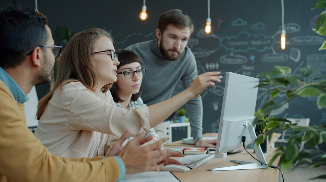 team reviewing business data