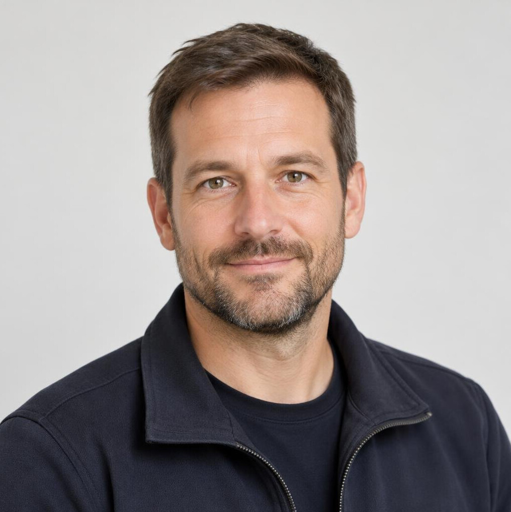 Portrait of a bearded man in a casual jacket
