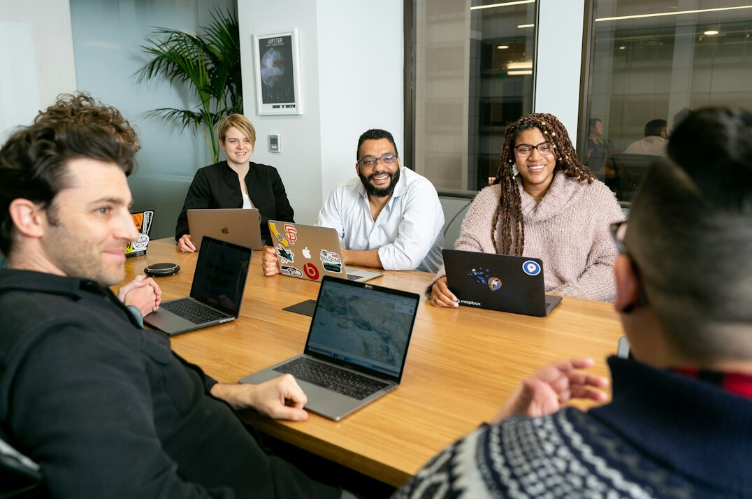 group discussing strategies