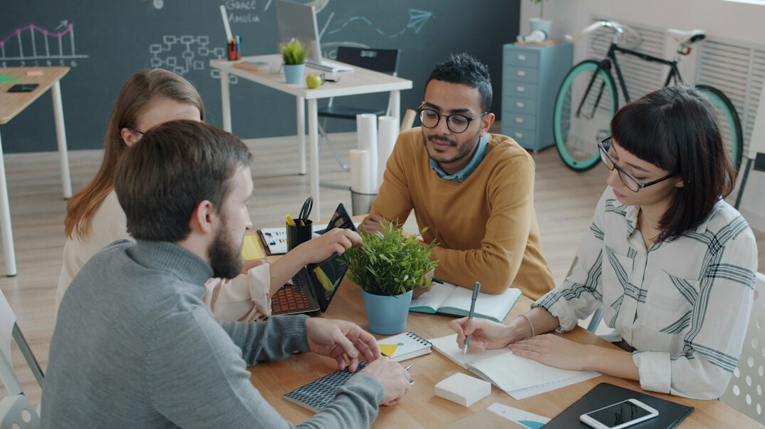 team discussing business strategy